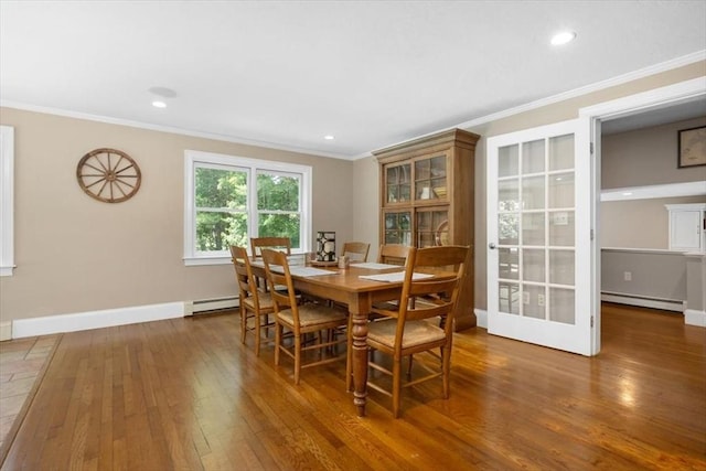 12 Whitcomb Ln, Hingham, MA 02043 - dining room with baseboard heating, hardwood / wood-style floors, ornamental molding, and recessed lighting