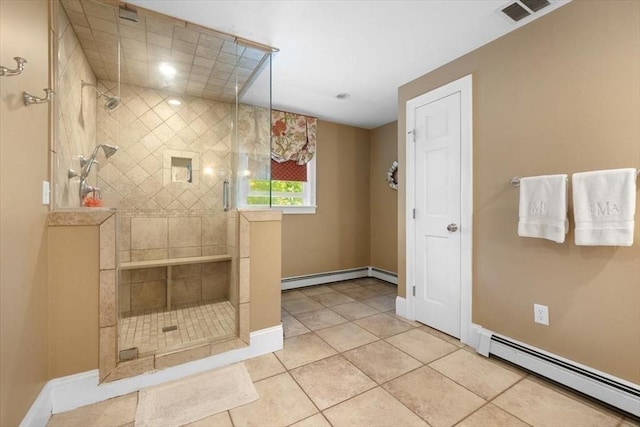 12 Whitcomb Ln, Hingham, MA 02043 - bathroom with baseboard heating, a stall shower, and tile patterned floors