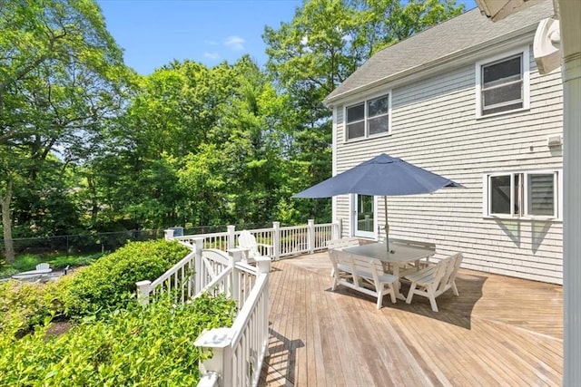 12 Whitcomb Ln, Hingham, MA 02043 - wooden terrace with outdoor dining area and view of scattered trees
