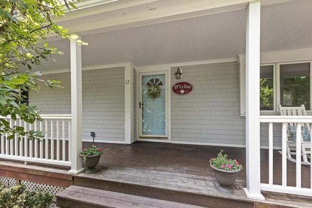 12 Whitcomb Ln, Hingham, MA 02043 - view of exterior entry with a porch