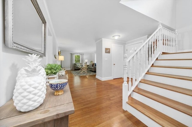 12 Whitcomb Ln, Hingham, MA 02043 - foyer with stairs and wood finished floors