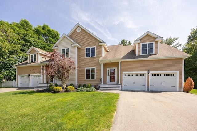 10 Chase Lndg Unit B, Easton, MA 02375 - traditional-style home with a front lawn, driveway, a garage, and roof with shingles