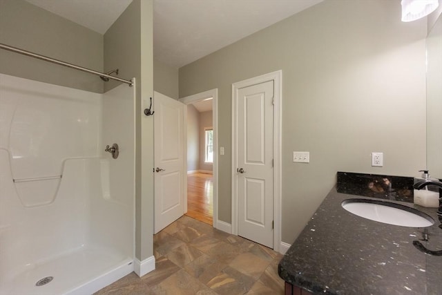 10 Chase Lndg Unit B, Easton, MA 02375 - bathroom with a shower, baseboards, and vanity