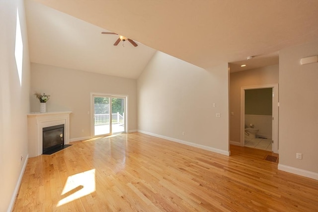 10 Chase Lndg Unit B, Easton, MA 02375 - unfurnished living room featuring light wood-style flooring, a fireplace with flush hearth, ceiling fan, baseboards, and lofted ceiling