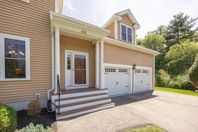 10 Chase Lndg Unit B, Easton, MA 02375 - property entrance featuring driveway and an attached garage