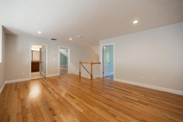 10 Chase Lndg Unit B, Easton, MA 02375 - empty room with light wood-type flooring, recessed lighting, and baseboards