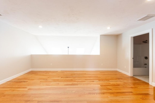 10 Chase Lndg Unit B, Easton, MA 02375 - spare room featuring light wood-type flooring, recessed lighting, baseboards, and vaulted ceiling
