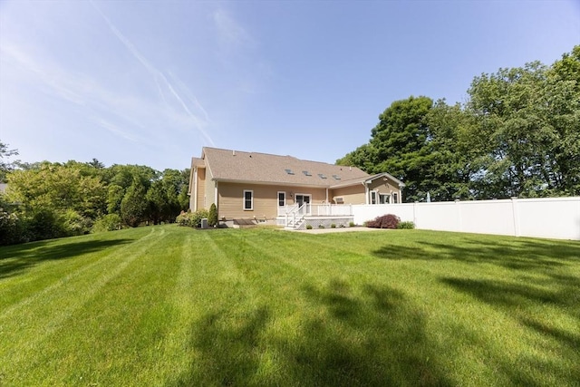 10 Chase Lndg Unit B, Easton, MA 02375 - rear view of house with a wooden deck
