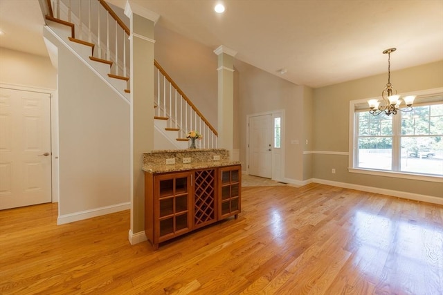 10 Chase Lndg Unit B, Easton, MA 02375 - foyer featuring plenty of natural light, light wood finished floors, stairway, baseboards, and vaulted ceiling
