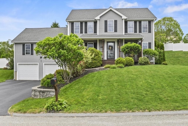 18 Jackson Ave, Rutland, MA 01543 - colonial-style house with an attached garage and driveway
