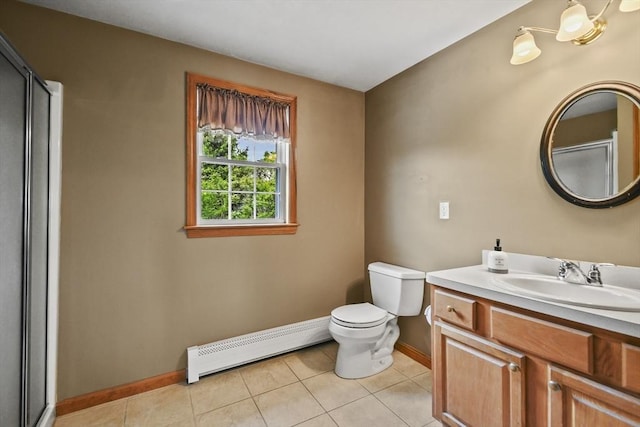 18 Jackson Ave, Rutland, MA 01543 - bathroom featuring a baseboard heating unit, baseboards, vanity, toilet, and tile patterned flooring