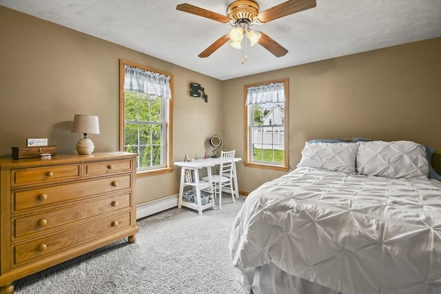 18 Jackson Ave, Rutland, MA 01543 - bedroom with baseboard heating, light colored carpet, baseboards, and a ceiling fan