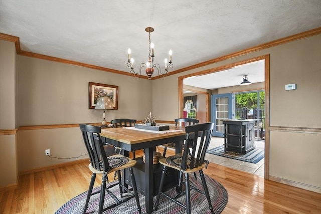 18 Jackson Ave, Rutland, MA 01543 - dining room featuring crown molding, a chandelier, light wood-style flooring, and baseboards