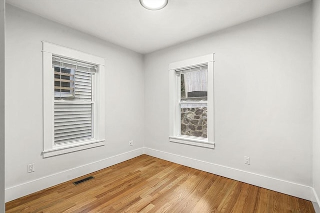 50 Cottage St Unit 1, Chelsea, MA 02150 - empty room featuring baseboards and light wood finished floors