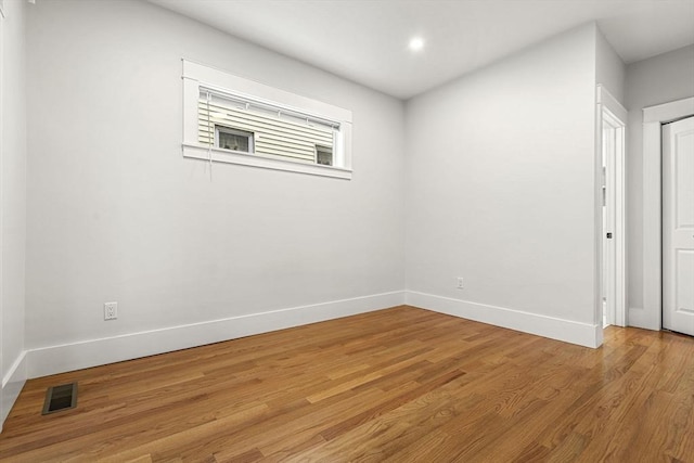 50 Cottage St Unit 1, Chelsea, MA 02150 - spare room with baseboards and light wood-style flooring