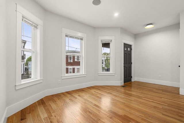 50 Cottage St Unit 1, Chelsea, MA 02150 - spare room featuring baseboards and light wood-style floors