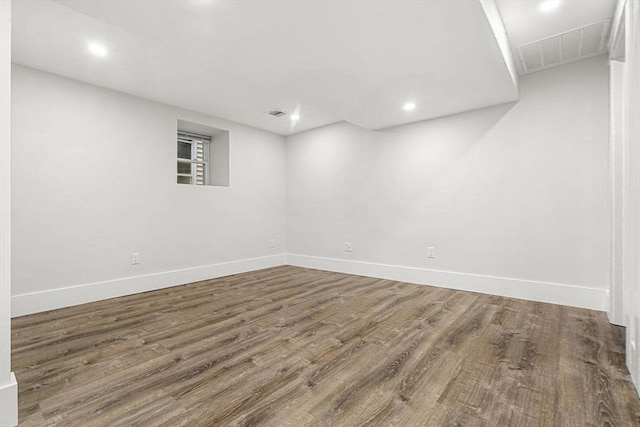50 Cottage St Unit 1, Chelsea, MA 02150 - finished below grade area with wood finished floors, baseboards, and recessed lighting