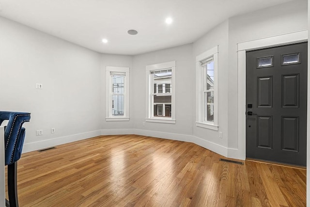 50 Cottage St Unit 1, Chelsea, MA 02150 - entrance foyer with baseboards, wood finished floors, and recessed lighting