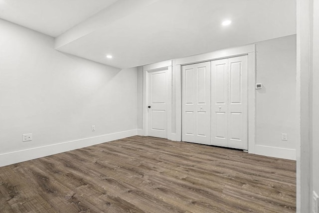 50 Cottage St Unit 1, Chelsea, MA 02150 - basement featuring wood finished floors, baseboards, and recessed lighting