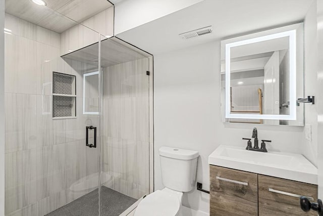50 Cottage St Unit 1, Chelsea, MA 02150 - bathroom with toilet, a stall shower, and vanity