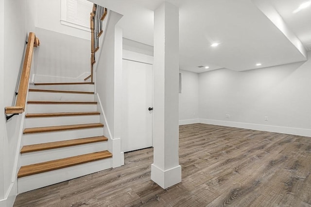 50 Cottage St Unit 1, Chelsea, MA 02150 - below grade area featuring wood finished floors, stairway, baseboards, and recessed lighting
