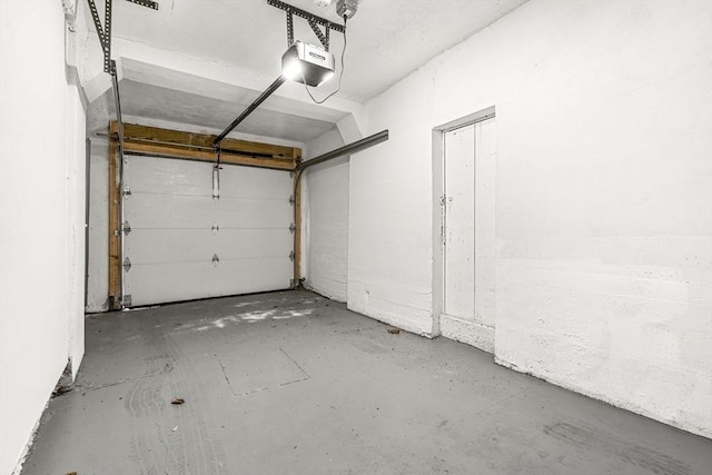 50 Cottage St Unit 1, Chelsea, MA 02150 - garage featuring a garage door opener