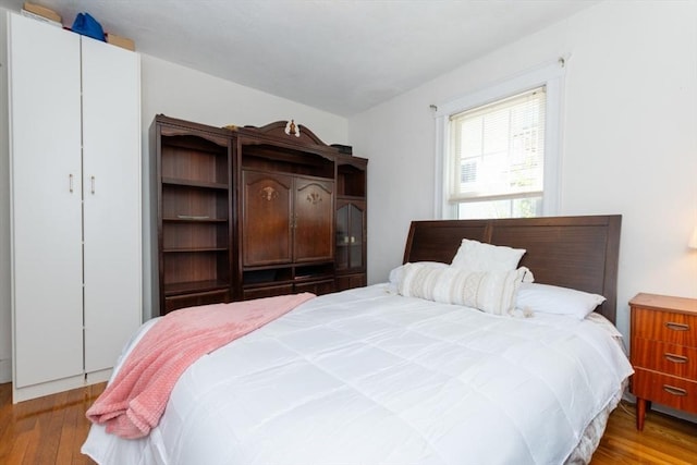 bedroom featuring hardwood / wood-style floors