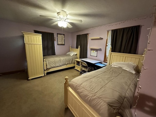 bedroom featuring carpet flooring, a ceiling fan, and baseboards