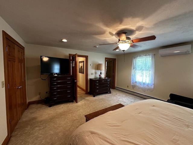 bedroom featuring a wall mounted AC, baseboard heating, light carpet, baseboards, and ceiling fan