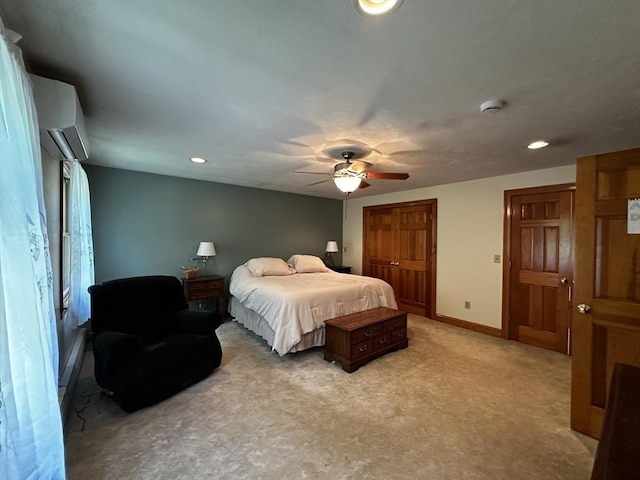 bedroom featuring light colored carpet, recessed lighting, a closet, baseboards, and ceiling fan