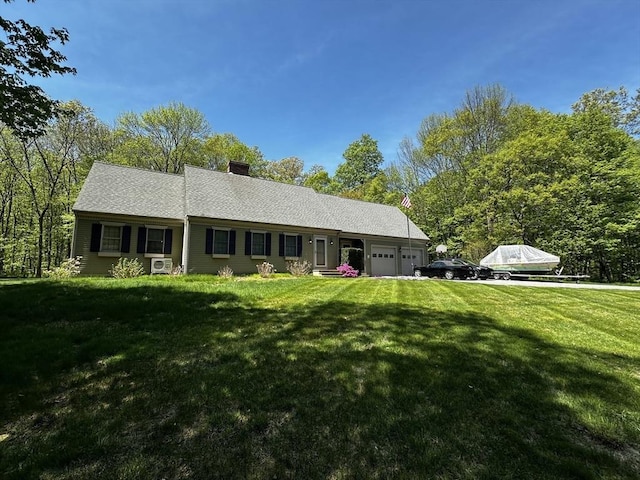 ranch-style home featuring an attached garage, a chimney, and a front lawn