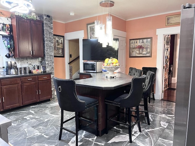 dining space with crown molding