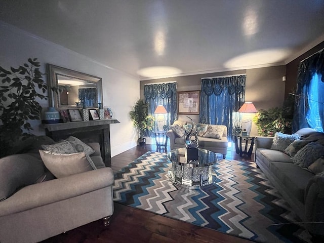 living room featuring ornamental molding and dark hardwood / wood-style floors