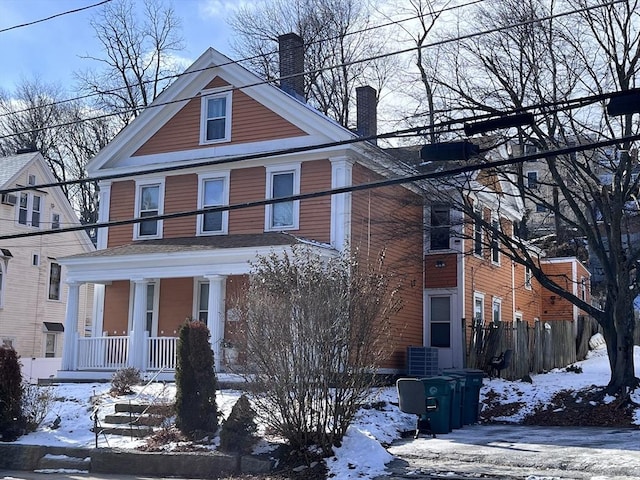 greek revival inspired property featuring covered porch