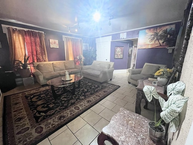 living room with tile patterned flooring and ornamental molding