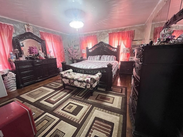 bedroom featuring dark wood-type flooring and ornamental molding