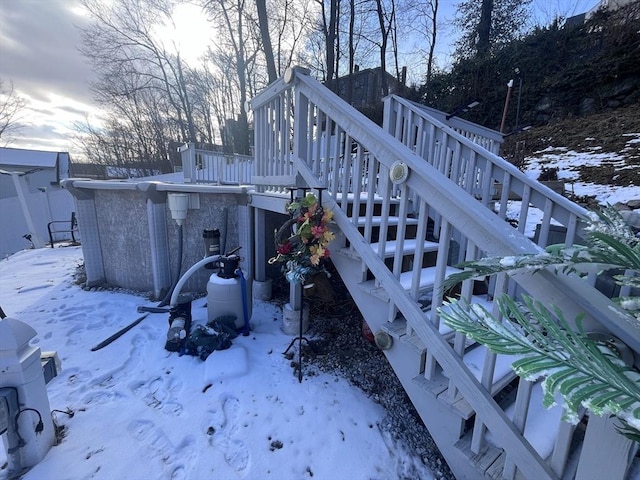 view of snow covered deck