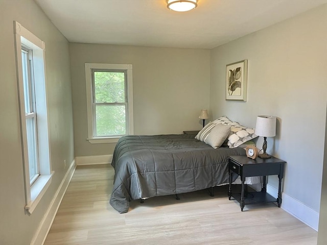 43 Aubin St Unit 1, Amesbury, MA 01913 - bedroom with light wood-style flooring and baseboards