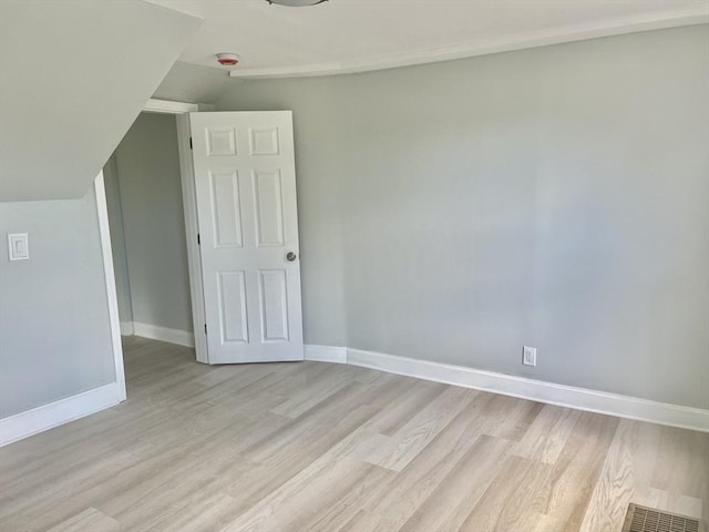 43 Aubin St Unit 1, Amesbury, MA 01913 - bonus room featuring vaulted ceiling, light wood finished floors, and baseboards