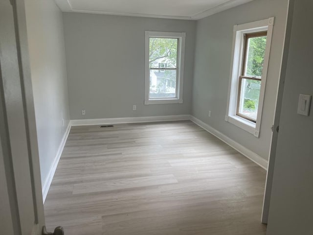 43 Aubin St Unit 1, Amesbury, MA 01913 - empty room featuring light wood finished floors and baseboards