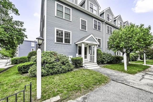 312 Water St Unit 1, Lawrence, MA 01841 - view of front of home featuring a front lawn