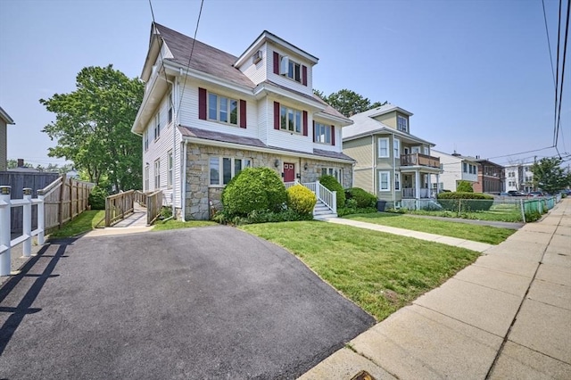 15 Hamilton St, Boston, MA 02136 - view of front of house with stone siding and a residential view