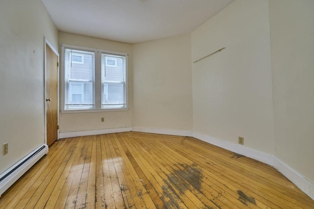 15 Hamilton St, Boston, MA 02136 - unfurnished room featuring a baseboard radiator and hardwood / wood-style flooring