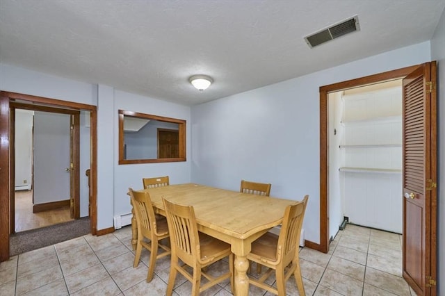 15 Hamilton St, Boston, MA 02136 - dining room featuring baseboard heating and light tile patterned floors