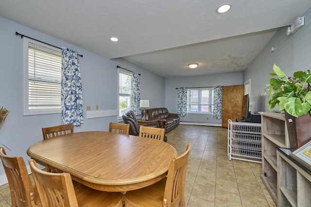 15 Hamilton St, Boston, MA 02136 - dining area featuring a baseboard heating unit, light tile patterned floors, and recessed lighting