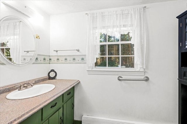 bathroom featuring vanity and a baseboard radiator