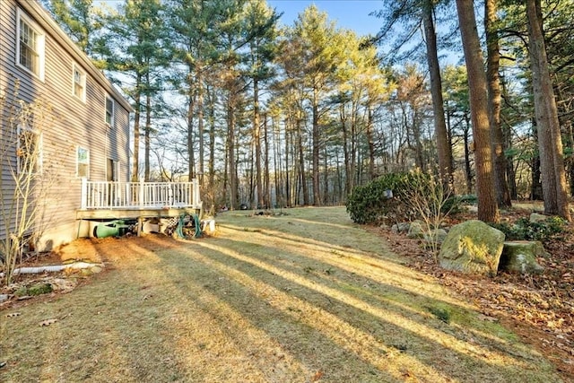 view of yard featuring a deck