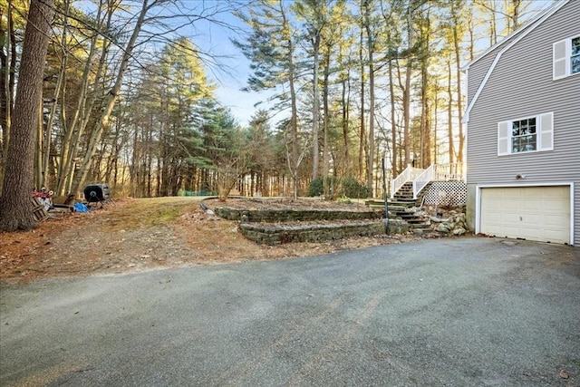 view of yard with a garage