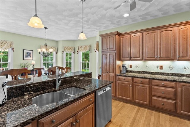89 Cortland Dr Unit 89, North Andover, MA 01845 - kitchen featuring dishwasher, a sink, pendant lighting, and plenty of natural light