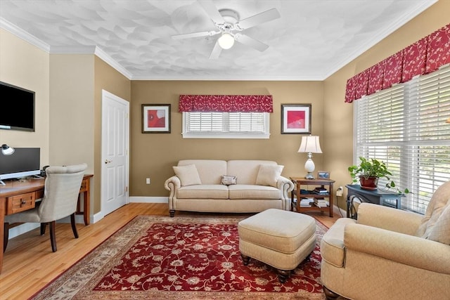 89 Cortland Dr Unit 89, North Andover, MA 01845 - living room featuring wood finished floors, baseboards, ceiling fan, ornamental molding, and an office area